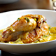Champagne-Poached Cornish Game Hens with Artichokes, Potatoes, Spring Onions and Roasted Garlic