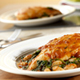 Braised Chicken with Savory White Beans & Spinach