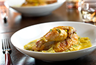Champagne-Poached Cornish Game Hens with Artichokes, Potatoes, Spring Onions and Roasted Garlic