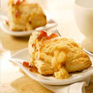 Apple Turnovers with Gingered Cranberry Caramel Sauce