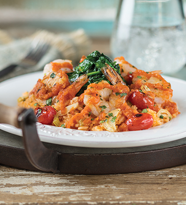 GARLIC SHRIMP WITH WILTED SPINACH & SPANISH RICE MADE WITH V8® SPICY HOT VEGETABLE JUICE GARLIC SHRIMP WITH WILTED SPINACH & SPANISH RICE MADE WITH V8® SPICY HOT VEGETABLE JUICE