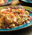 BAJA CHICKEN, SHRIMP & CHORIZO OVER WEHANI RICE BAJA CHICKEN, SHRIMP & CHORIZO OVER WEHANI RICE