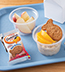 OATMEAL TOPPED WITH PEACHES AND GIANT GOLDFISH® MADE WITH WHOLE GRAIN GRAHAMS OATMEAL TOPPED WITH PEACHES AND GIANT GOLDFISH® MADE WITH WHOLE GRAIN GRAHAMS