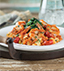 GARLIC SHRIMP WITH WILTED SPINACH & SPANISH RICE MADE WITH V8® SPICY HOT VEGETABLE JUICE GARLIC SHRIMP WITH WILTED SPINACH & SPANISH RICE MADE WITH V8® SPICY HOT VEGETABLE JUICE