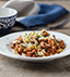 CHICKEN CHILAQUILES WITH SPICY TOMATO SAUCE MADE WITH V8® SPICY HOT VEGETABLE JUICE CHICKEN CHILAQUILES WITH SPICY TOMATO SAUCE MADE WITH V8® SPICY HOT VEGETABLE JUICE