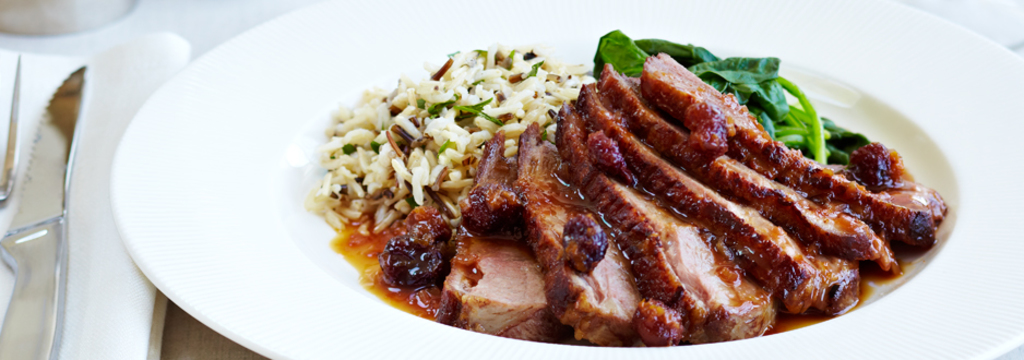 Pan seared Duck Breast with dried Cranberry Orange Reduction