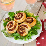 Date and Gorgonzola Pinwheels over Greens