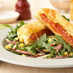 Tomato Wellingtons over Duck Confit Salad