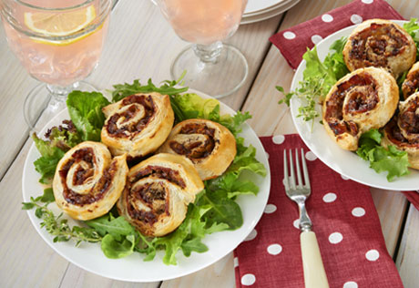 Date and Gorgonzola Pinwheels over Greens